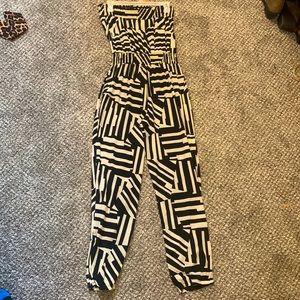 Cream and black pattern tube jumpsuit. Elastic at top and waist. SIZE M.
